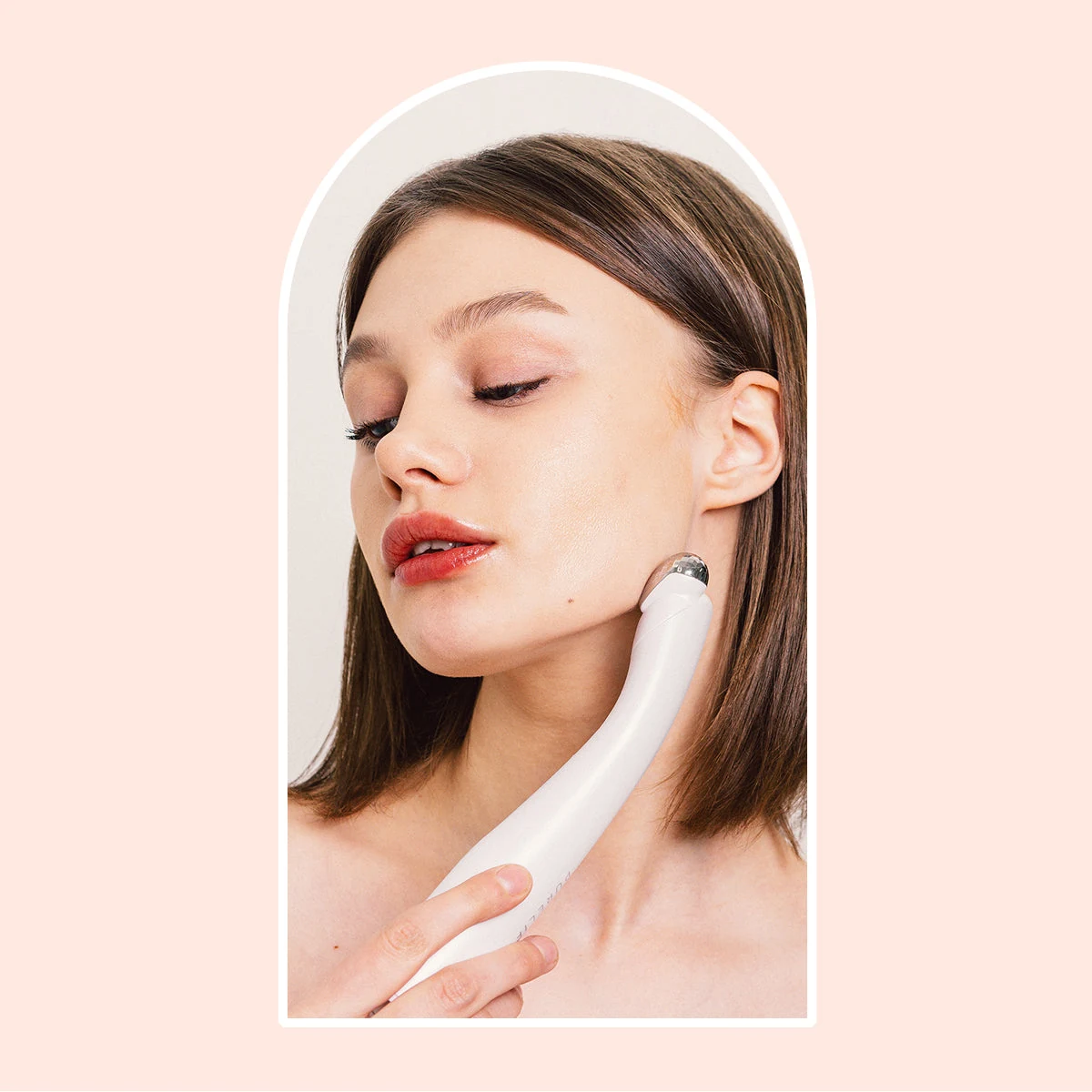 Anywell facial-care imagery showing a handheld skincare device